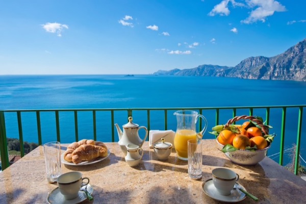 Casa Regina: panoramic breakfast on the terrace with wonderful view on sea and Amalfi Coast