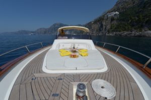 Aperitif on the front of modern gozzo boat Teo