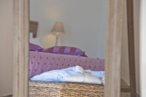 Casa Coccinella interior bedroom and towel for guests