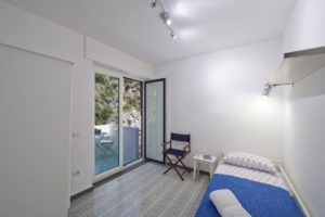 Casa Terramare single bedroom with access to the terrace