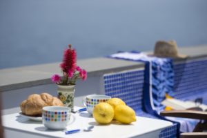 Suite Terramare breakfast on the terrace with croissant and lemons